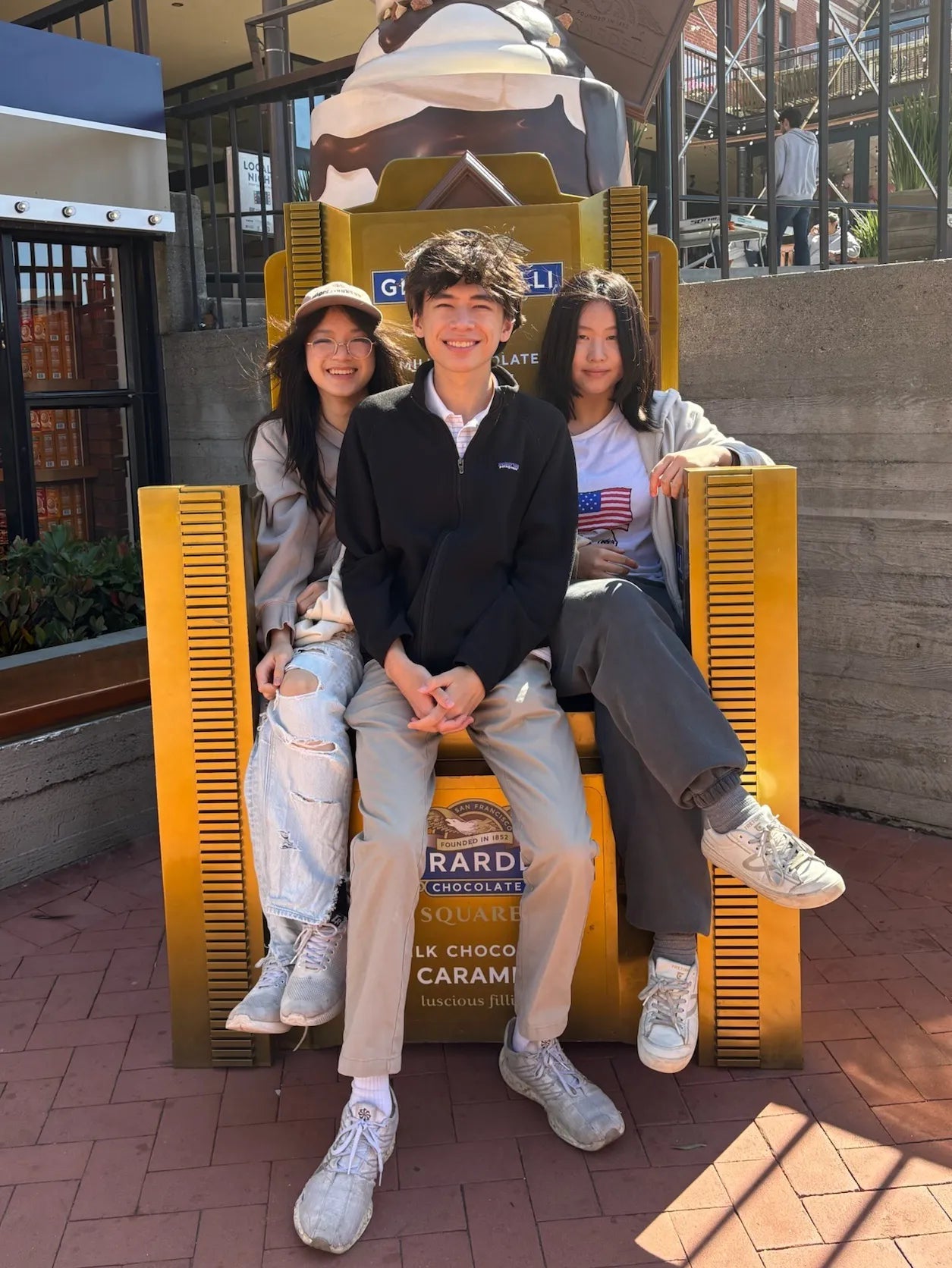 The three of us on a bench at Ghirardelli Square in San Francisco